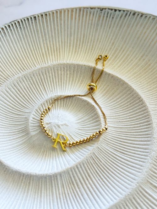Pulsera R gold