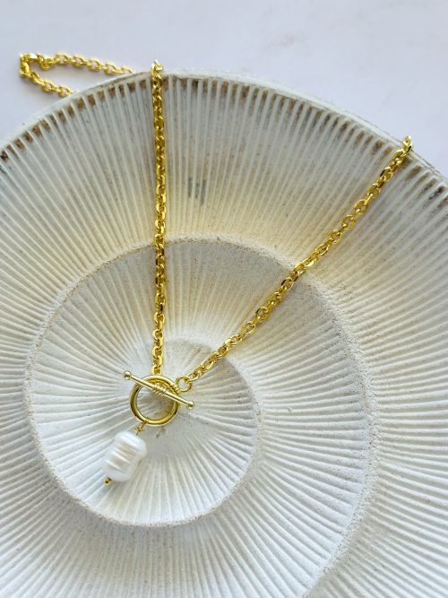 Collar timón perla Río gold